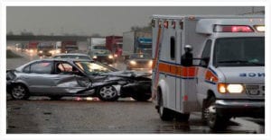 image of car crash with emergency responders