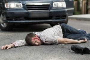 Photo of a dead man on the road after getting hit by a car